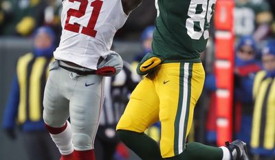 New York Giants strong safety Landon Collins (21) breaks up a pass intended for Green Bay Packers tight end Jared Cook (89) during the first half of an NFC wild-card NFL football game, Sunday, Jan. 8, 2017, in Green Bay, Wis. (AP Photo/Matt Ludtke)