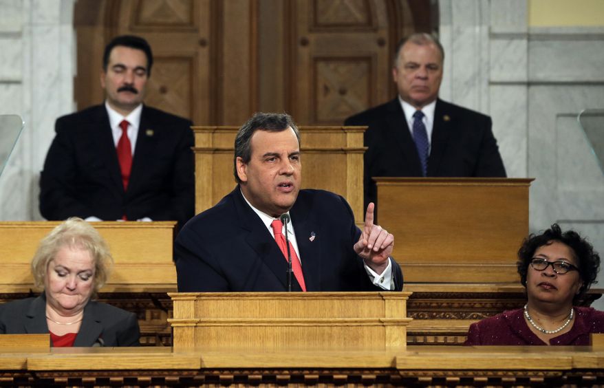 FILE- In this Jan. 12, 2016, file photo, Assembly Speaker Vincent Prieto, D-Secaucus, N.J., back left, and Senate President Stephen M. Sweeney, back right, D-West Deptford, N.J., listen as New Jersey Gov. Chris Christie delivers his State of the State address in the Statehouse in Trenton, N.J. Christie will deliver his seventh state of the state address next week ahead of his final year in office. (AP Photo/Mel Evans, File)