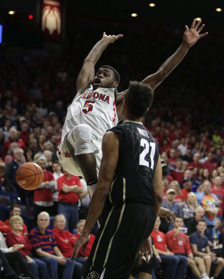 Arizona guard Kadeem Allen (5) loses the ball in front of Colorado guard Derrick White during the second half of an NCAA college basketball game, Saturday, Jan. 7, 2017, in Tucson, Ariz. Arizona defeated Colorado 82-73. (AP Photo/Rick Scuteri)