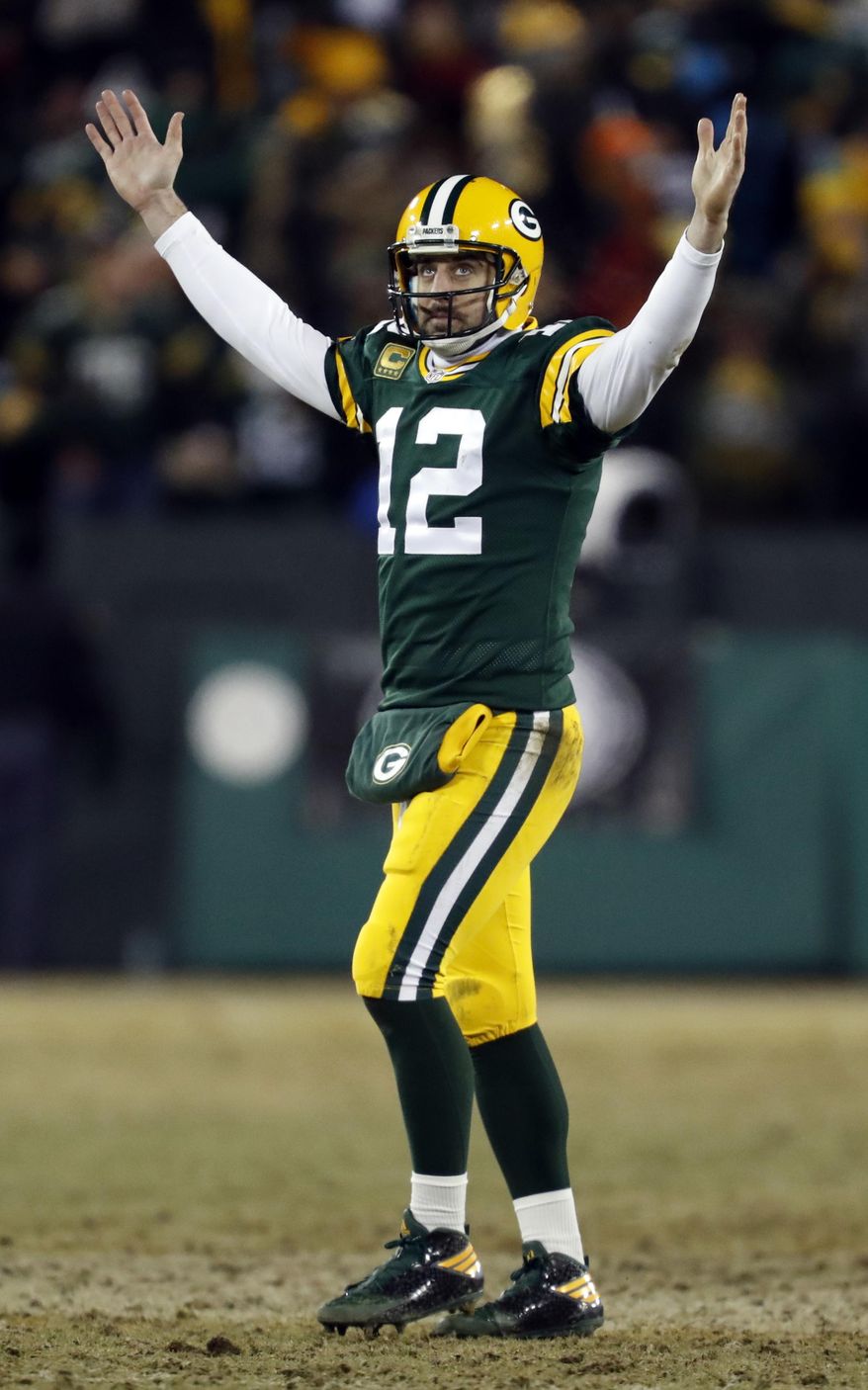 Green Bay Packers quarterback Aaron Rodgers (12) celebrates after throwing a touchdown pass to wide receiver Randall Cobb (18) during the first half of an NFC wild-card NFL football game against the New York Giants, Sunday, Jan. 8, 2017, in Green Bay, Wis. (AP Photo/Matt Ludtke)
