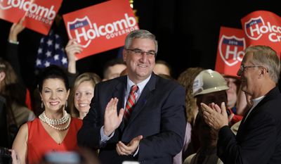 FILE - In this Nov. 8, 2016, file photo, Republican gubernatorial candidate Lt. Gov. Eric Holcomb thanks supporters after winning his race at an election night rally in Indianapolis. Holcomb&#x27;s inauguration as Indiana governor on Monday, Jan. 9, 2017, will complete a whirlwind ascension in the past year from a virtually unknown candidate to the state&#x27;s top office. (AP Photo/Michael Conroy, File)
