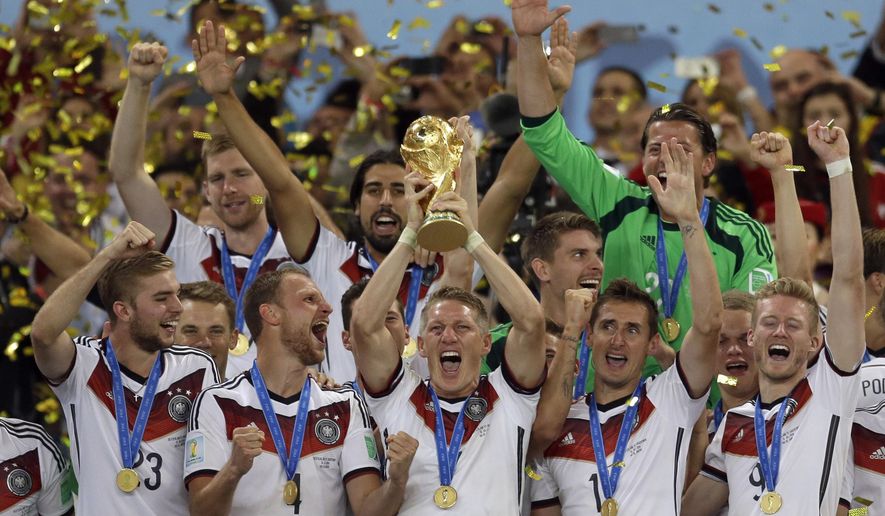 In this July 13, 2014, file photo Germany&#39;s Bastian Schweinsteiger holds up the World Cup trophy as the team celebrates their 1-0 victor over Argentina after the World Cup final soccer match between Germany and Argentina at the Maracana Stadium in Rio de Janeiro, Brazil. FIFA is about to make the World Cup a bigger and, it hopes, richer event even at the cost of lower quality soccer. FIFA President Gianni Infantino hopes his ruling Council will agree Tuesday, Jan. 10, 2017, to expand the 2026 World Cup to 48 nations, playing in 16 groups of three teams. (AP Photo/Natacha Pisarenko, file)