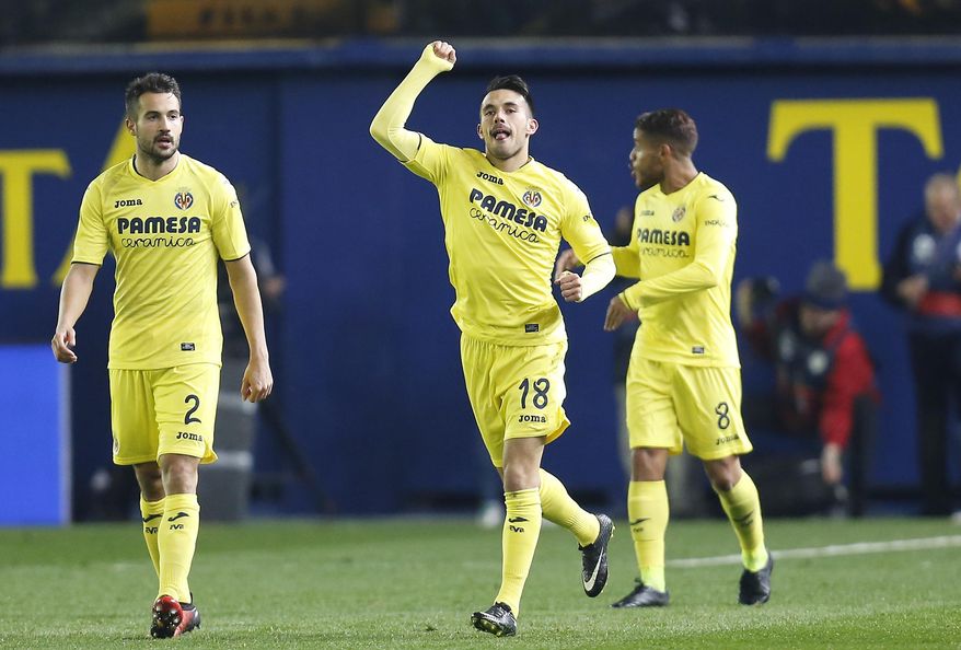 Villarreal's Nicola Sansone celebrates after scoring against Barcelona during the Spanish La Liga soccer match between Villarreal and Barcelona at the Ceramica stadium in Villarreal, Spain, Sunday, Jan. 8, 2017. (AP Photo/Alberto Saiz)