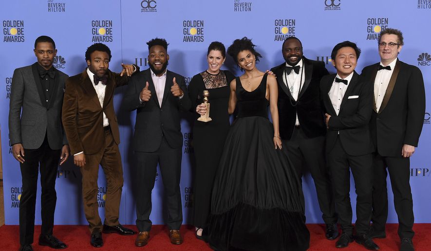 The cast and crew of &amp;quot;Atlanta&amp;quot; poses in the press room with the award for best television series - musical or comedy at the 74th annual Golden Globe Awards at the Beverly Hilton Hotel on Sunday, Jan. 8, 2017, in Beverly Hills, Calif. (Photo by Jordan Strauss/Invision/AP)