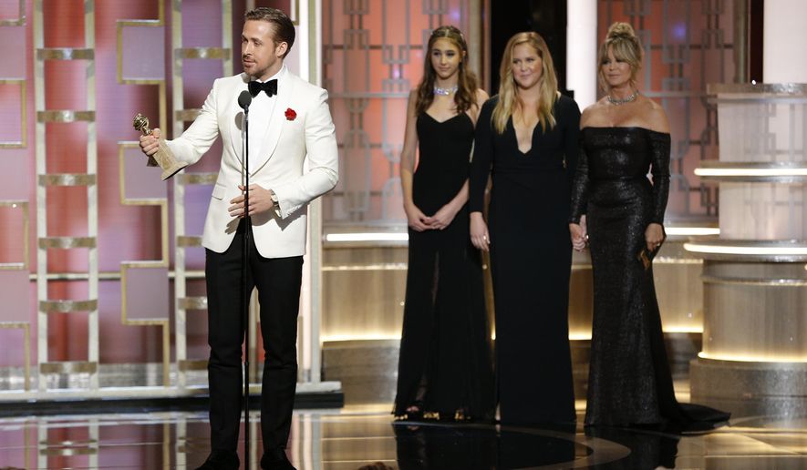 This image released by NBC shows Ryan Gosling with the award for best actor in a motion picture musical or comedy for &amp;quot;La La Land,&amp;quot; at the 74th Annual Golden Globe Awards at the Beverly Hilton Hotel in Beverly Hills, Calif., on Sunday, Jan. 8, 2017. (Paul Drinkwater/NBC via AP)