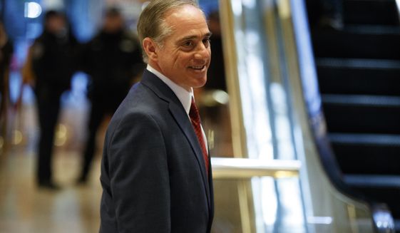 David Shulkin, the Under Secretary of Health at the Department of Veterans Affairs, leaves a meeting with President-elect Donald Trump at Trump Tower, Monday, Jan. 9, 2017, in New York. (AP Photo/Evan Vucci)