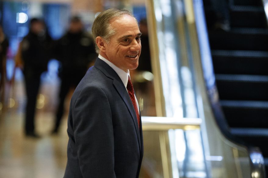 David Shulkin, the Under Secretary of Health at the Department of Veterans Affairs, leaves a meeting with President-elect Donald Trump at Trump Tower, Monday, Jan. 9, 2017, in New York. (AP Photo/Evan Vucci)