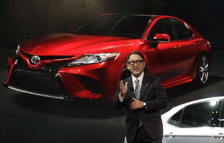 Toyota President Akio Toyoda introduces the 2018 Toyota Camry at the North American International Auto show, Monday, Jan. 9, 2017, in Detroit. (AP Photo/Carlos Osorio)