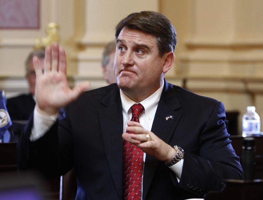 FILE - In this Wednesday Jan. 11, 2012 file photo, State Sen. Bryce Reeves, R-Spotsylvania waves to the gallery at the start of the 2012 session of the Virginia Senate at the Capitol in Richmond, Va. Reeves is running for the Republican nomination for Lt. Governor. (AP Photo/Steve Helber)