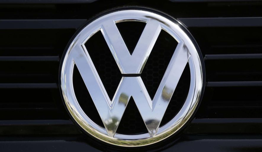 In this Sept. 21, 2015, file photo, a Volkswagen logo is seen on car offered for sale at New Century Volkswagen dealership in Glendale, Calif. The Volkswagen executive, Oliver Schmidt, who once was in charge of complying with U.S. emissions regulations has been arrested in connection with the company’s emissions-cheating scandal, a person briefed on the matter said Monday, Jan. 9, 2017. (AP Photo/Damian Dovarganes, File)