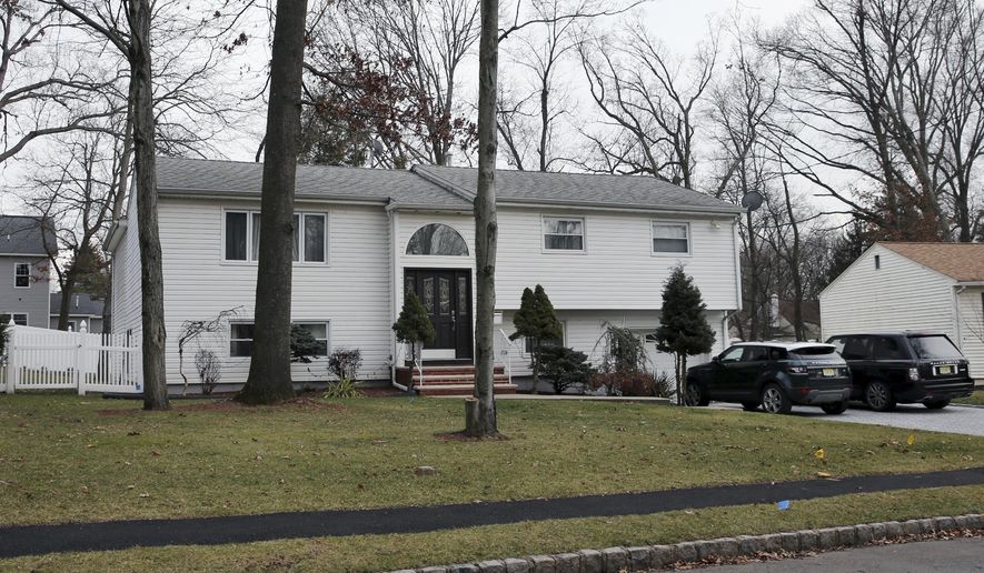 In this Jan. 5, 2017, photo, the home of Dan Zhong is seen in Livingston, N.J. Zhong, a businessman imprisoned on charges that he forced immigrant laborers to do construction at Chinese diplomatic facilities in the U.S. wants permission to turn his New Jersey home into a private jail where he can comfortably await trial. (AP Photo/Mel Evans)