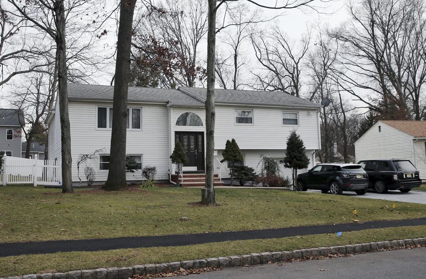 In this Jan. 5, 2017, photo, the home of Dan Zhong is seen in Livingston, N.J. Zhong, a businessman imprisoned on charges that he forced immigrant laborers to do construction at Chinese diplomatic facilities in the U.S. wants permission to turn his New Jersey home into a private jail where he can comfortably await trial. (AP Photo/Mel Evans)