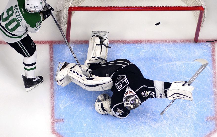 Los Angeles Kings goalie Peter Budaj, of Slovakia, is scored on by Dallas Stars center Tyler Seguin as center Jason Spezza, left, stands by during the first period of an NHL hockey game, Monday, Jan. 9, 2017, in Los Angeles. (AP Photo/Mark J. Terrill)