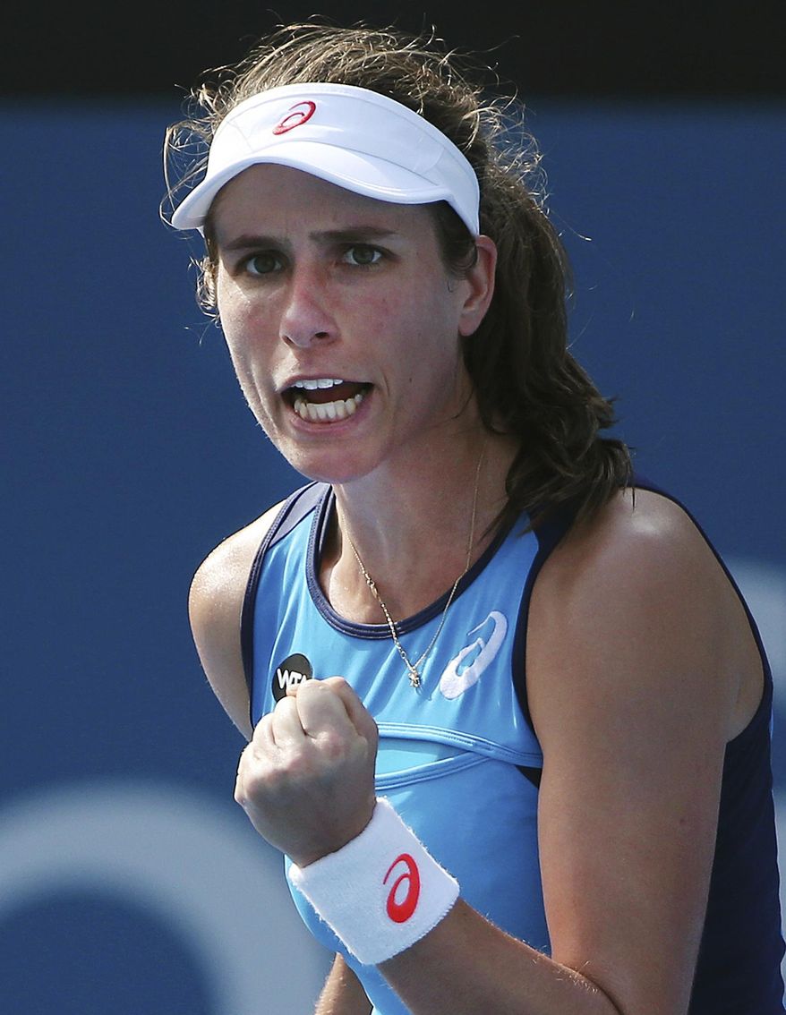 Britain's Johanna Konta celebrates winning the first set against Australia's Daria Gavrilova during their women's singles match at the Sydney International tennis tournament in Sydney, Australia, Tuesday, Jan. 10, 2017. (AP Photo/Rick Rycroft)