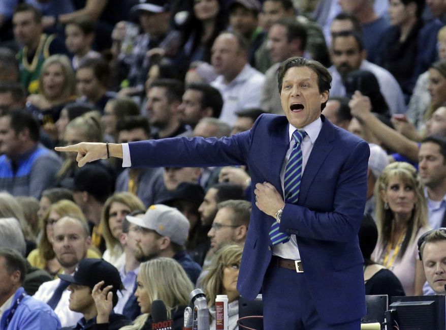 Utah Jazz head coach Quin Snyder shouts to his team in the first half during an NBA basketball game against the Cleveland Cavaliers Tuesday, Jan. 10, 2017, in Salt Lake City. (AP Photo/Rick Bowmer)