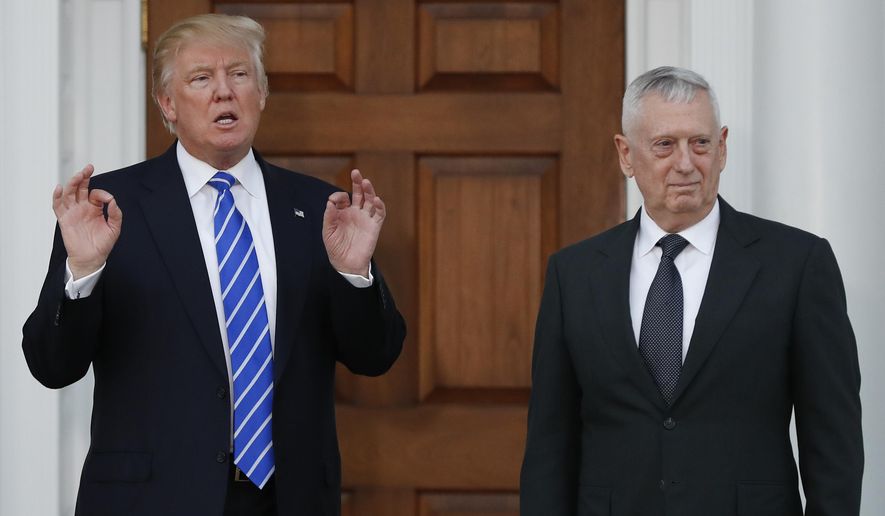 In this photo taken Nov. 19, 2016, Defense Secretary-designate James Mattis stands with President-elect Donald Trump in Bedminster, N.J. Senators signaled little opposition Tuesday, Jan. 10, 2017, to the nomination of Mattis, as national security experts recommended lawmakers amend the law and allow the retired Marine Corps general to head the Pentagon for President-elect Donald Trump. (AP Photo/Carolyn Kaster)