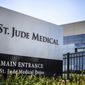 This Wednesday, July 22, 2015, file photo shows St. Jude Medical corporate headquarters, in Little Canada, Minn., just north of St. Paul. (Glen Stubbe/Star Tribune via AP, File)