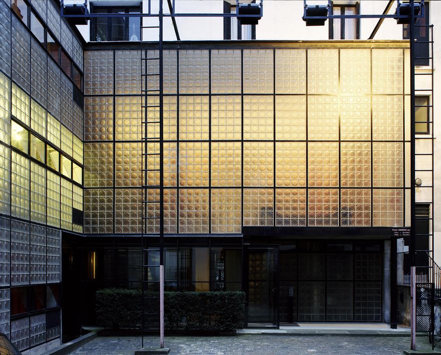 This undated photo provided by the Jewish Museum shows Pierre Chareau's (French, 1883-1950) and Bernard Bijvoet's (Dutch, 1889-1979), glass house Maison de Verre. The photo is part of the exhibition "Pierre Chareau: Modern Architecture and Design," at The Jewish Museum in New York. (Mark Lyon/The Jewish Museum via AP)