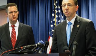 Maryland U.S. Attorney Rod Rosenstein announces the guilty pleas of former Prince George&#39;s County Councilman and Del. William Alberto Campos-Escobar on conspiracy and bribery charges during a news conference Tuesday, Jan. 10, 2017, in Greenbelt, Maryland. Prosecutors said the 42-year-old Campos-Escobar, who goes by Campos, conspired to solicit and accept bribes in exchange for favorable actions. The FBI Baltimore&#39;s Assistant Special Agent in Charge Scott Hinckley stands at left. (AP Photo/Brian Witte)