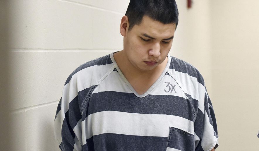 Joshua Rayvon LeClaire, 25, is escorted to court at the Minnehaha County Jail in Sioux Falls on Tuesday, Jan. 10, 2017. LeClaire is being changed with murder of local trans woman, Jamie Lee Wounded Arrow. (Jay Pickthorn/Sioux Falls Argus Leader via AP)