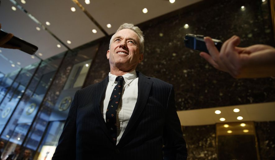 Robert F. Kennedy Jr. talks with reporters in the lobby of Trump Tower in New York, Tuesday, Jan. 10,2017, after meeting with President-elect Donald Trump. (AP Photo/Evan Vucci)