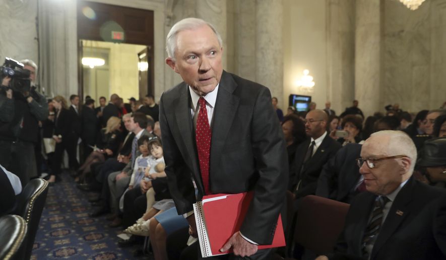 Attorney General-designate, Sen. Jeff Sessions, R-Ala., takes his seat on Capitol Hill in Washington, Tuesday, Jan. 10, 2017. where he was to testify at his confirmation hearing before the Senate Judiciary Committee. Former Attorney General Michael Mukasey is at right. (AP Photo/Andrew Harnik)