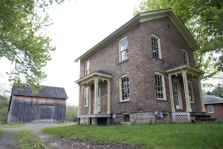 FILE- In this May 19, 2016, file photo, the Harriet Tubman Residence is seen at the Harriet Tubman Home in Auburn, N.Y. New York lawmakers and federal parks officials are gathering in Washington, to formally establish the Harriet Tubman National Historical Park in New York. U.S. Interior Secretary Sally Jewell will preside over an official signing ceremony Tuesday, Jan. 10, 2017, that will make the park part of the National Park System. (AP Photo/Mike Groll, File)