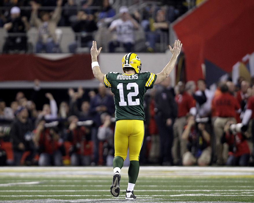 15. Super Bowl XLV, Feb. 6, 2011 — Arlington, Texas
Packers 31, Steelers 25
Green Bay Packers' Aaron Rodgers reacts after throwing a touchdown pass during the first half of the NFL football Super Bowl XLV. (AP Photo/Eric Gay)