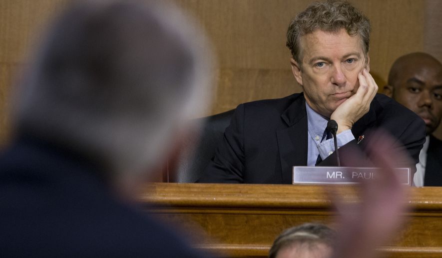 Senate Foreign Relations Committee member Sen. Rand Paul, R-Ky. listens at right as Secretary of State-designate Rex Tillerson testifies on Capitol Hill in Washington, Wednesday, Jan. 11, 2017, during his confirmation hearing before the committee. (Associated Press) **FILE**