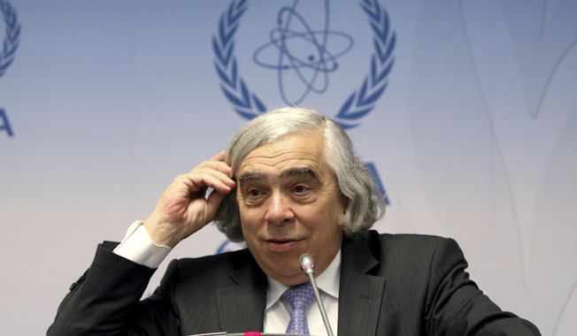 FILE - In this Sept. 26, 2016 file photo, Energy Ernest Moniz speaks in Vienna, Austria. Moniz says any effort to revive the long-dormant nuclear waste dump at Nevada&#x27;s Yucca Mountain is doomed to fail because the project lacks support from elected officials in the state.  (AP Photo/Ronald Zak, File)