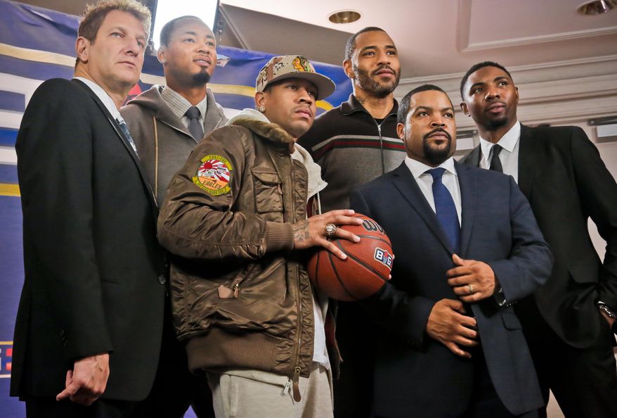 Entertainment executive Jeff Kwatinetz, far left, and entertainer Ice Cube, second from right, pose with former NBA players Kenyon Martin, second from left, Allen Iverson, third from left, Rashard Lewis, third from right, and Roger Mason, far right, after a press conference announcing the launch of BIG3, a new 3-on-3 professional basketball league, in New York, Wednesday, Jan. 11, 2017. (AP Photo/Bebeto Matthews)