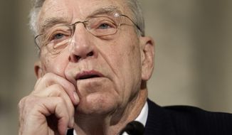 Senate Judiciary Committee Chairman Chuck Grassley, Iowa Republican, wants to slow down an investigation in order to take a thorough look at 35 pages of unsubstantiated, salacious opposition research by a former British intelligence officer that almost disrupted Donald Trump&#39;s presidential campaign. (Associated Press/File)