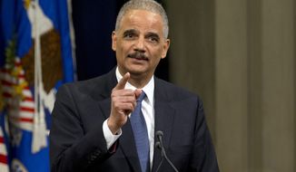In this April 24, 2015, file photo, then-Attorney General Eric Holder speaks at the Justice Department in Washington. Holder on Thursday, Jan. 12, 2017, formally announced a new effort aimed at challenging the partisan gerrymandering that’s left Democrats struggling to win local and state offices. (AP Photo/Manuel Balce Ceneta, File)