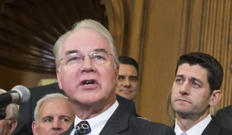 In this Jan. 7, 2016, file photo, Health and Human Services Secretary-designate Rep. Tom Price, R-Ga., speaks on Capitol Hill in Washington as House Speaker Paul Ryan of Wis. listens at right. Price says he will sell off stock holdings to avoid any conflicts of interest, or the appearance of a conflict. (AP Photo/J. Scott Applewhite, File)