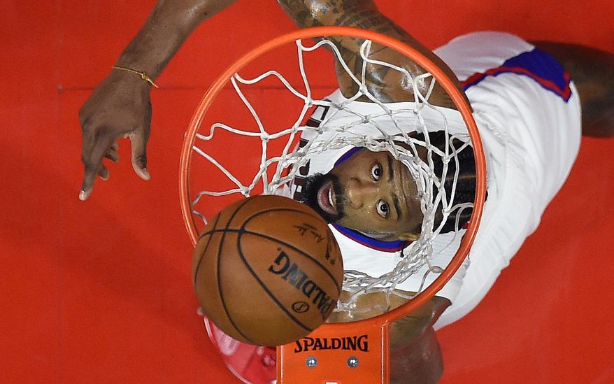 Los Angeles Clippers center DeAndre Jordan watches his shot during the first half of an NBA basketball game against the Orlando Magic, Wednesday, Jan. 11, 2017, in Los Angeles. (AP Photo/Mark J. Terrill)