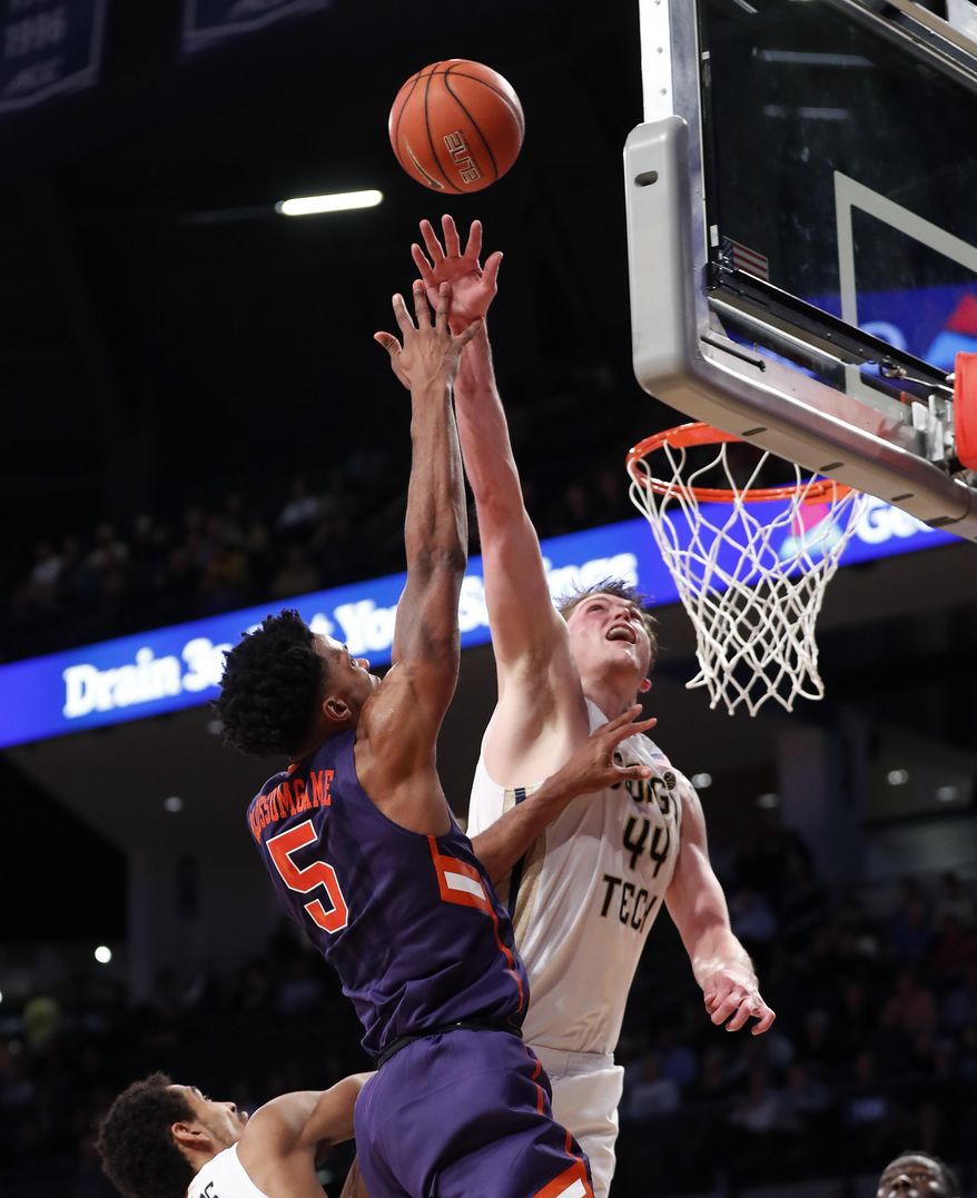 Clemson forward Jaron Blossomgame (5) shoots against Georgia Tech center Ben Lammers (44) in the second half of an NCAA college basketball game Thursday, Jan. 12, 2017, in Atlanta. Tech won 75-63. (AP Photo/John Bazemore)