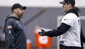 In this photo from Wednesday, Jan. 11, 2017, Pittsburgh Steelers offensive coordinator Todd Haley, left, talks with quarterback Ben Roethlisberger during NFL football practice in Pittsburgh. Haley insists there is no lingering resentment over his firing by the Kansas City Chiefs five years ago. But the fiery Pittsburgh offensive coordinator wouldn&#39;t mind showing the Chiefs what they missed out on when the Steelers visit Kansas City in an NFL AFC Divisional Playoff game on Sunday. (AP Photo/Keith Srakocic)