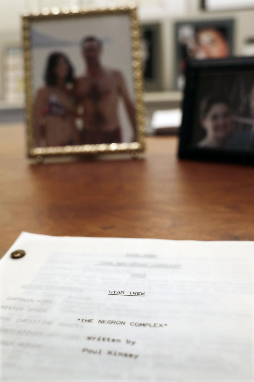 In this Monday, Jan. 9, 2017 photo, donated props from the show "Mad Men" are seen on display at the University of Texas' Harry Ransom Center humanities library in Austin, Texas. The "Star Trek" episode is a snap-shot of the attention to detail that sometimes surprised even Weiner. The episode titled "The Negron Complex" is a 74-page script, from dialogue between Capt. Kirk and Spock to camera angle instructions. (AP Photo/Eric Gay)