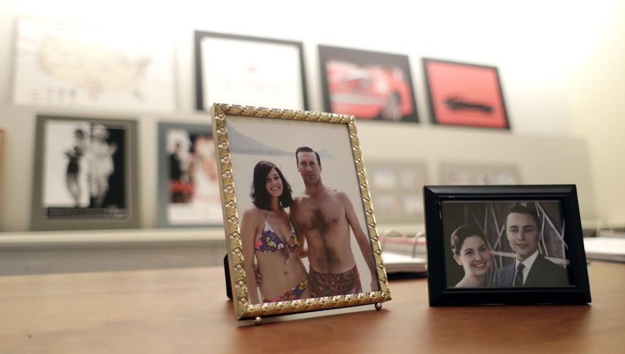 In this Monday, Jan. 9, 2017 photo, donated props from the show "Mad Men" are seen on display at the University of Texas' Harry Ransom Center humanities library in Austin, Texas. Included in the donation are boxes of scripts, drafts and notes, props, costumes, digital video and reams of research materials that went into creating the show's richly-detailed presentation of the American 1960s. (AP Photo/Eric Gay)