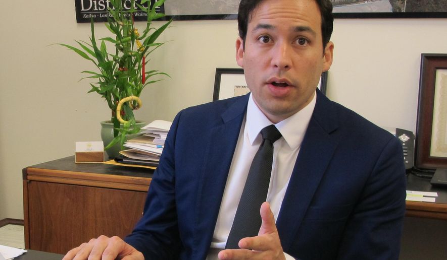 Hawaii state Rep. Chris Lee talks about a bill he's proposing to require presidential candidates to release tax returns on Wednesday, Jan. 11, 2017, in Honolulu. Lawmakers in Hawaii and several other states want to prevent presidential candidates from appearing on their states' ballots unless the candidates release their tax returns. (AP Photo/Cathy Bussewitz)