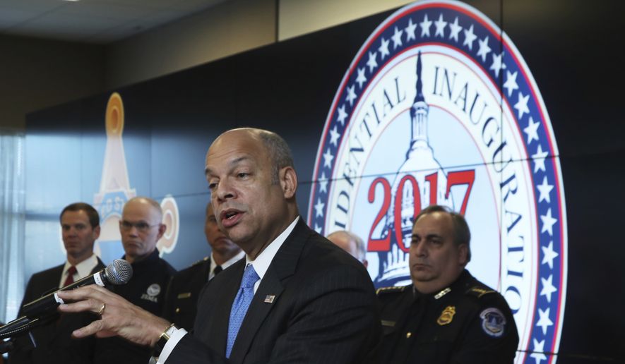 Homeland Security Secretary Jeh Johnson, with U.S. Capitol Police Chief Matthew Verderosa, back right, speaks during a news conference about the security for the presidential inauguration and activities related to it, Friday, Jan. 13, 2017, at the Multi Agency Communications Center (MACC) in Dulles, Va. (AP Photo/Manuel Balce Ceneta)