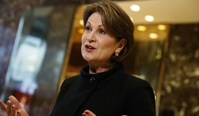 Lockheed Martin CEO Marillyn Hewson talks to reporters in the lobby of Trump Tower in New York, Friday, Jan. 13, 2017, after a meeting with President-elect Donald Trump. (AP Photo/Evan Vucci)