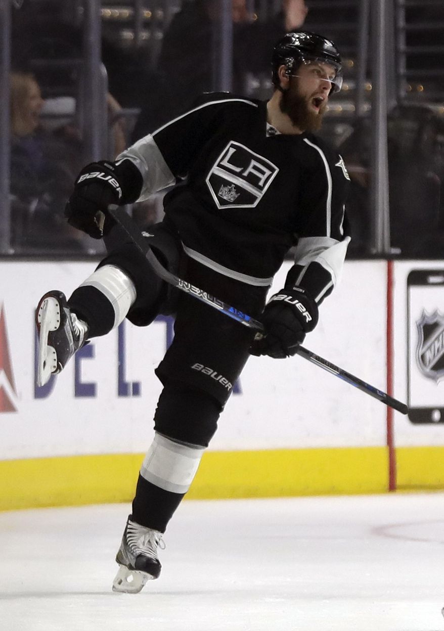 Los Angeles Kings defenseman Jake Muzzin celebrates after scoring during the first period of an NHL hockey game against the St. Louis Blues in Los Angeles, Thursday, Jan. 12, 2017. (AP Photo/Chris Carlson)