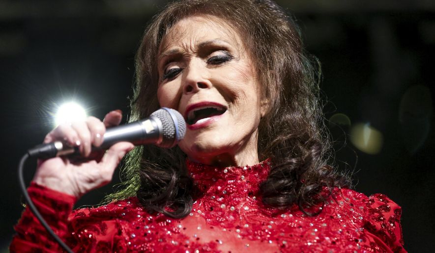 FILE - In this March 17, 2016 file photo, Loretta Lynn performs at the BBC Music Showcase at Stubb's during South By Southwest in Austin, Texas. The Country Music Hall of Fame and Museum will feature exhibits on Lynn, Faith Hill and Tim McGraw, Jason Aldean, and Shania Twain in 2017. The museum announced Friday, Jan. 13, 2017 their slate of exhibitions for the new year, which also includes a new exhibition called American Currents, focusing on music from 2016. (Photo by Rich Fury/Invision/AP)