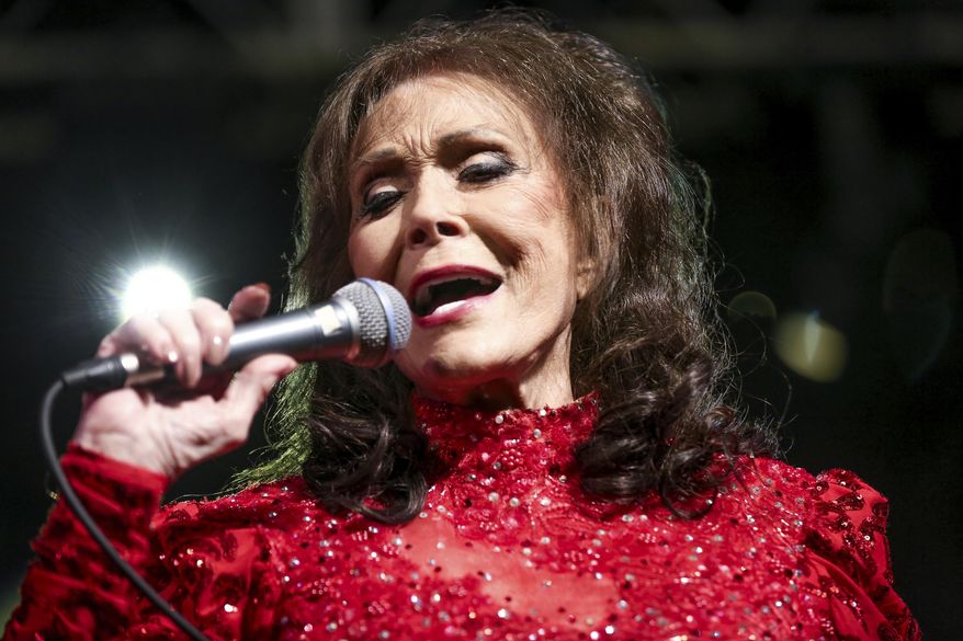 FILE - In this March 17, 2016 file photo, Loretta Lynn performs at the BBC Music Showcase at Stubb's during South By Southwest in Austin, Texas. The Country Music Hall of Fame and Museum will feature exhibits on Lynn, Faith Hill and Tim McGraw, Jason Aldean, and Shania Twain in 2017. The museum announced Friday, Jan. 13, 2017 their slate of exhibitions for the new year, which also includes a new exhibition called American Currents, focusing on music from 2016. (Photo by Rich Fury/Invision/AP)