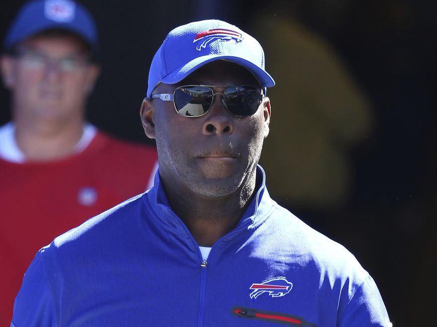 FILE - In this Sept. 25, 2016, file photo, Buffalo Bills offensive coordinator Anthony Lynn walks to the field before an NFL football game against the Arizona Cardinals in Orchard Park, N.Y. The NFL will have eight minority head coaches in 2017, tying the most for the beginning of one season.With the hirings of Lynn by the San Diego Chargers and Vance Joseph by the Denver Broncos, the eight minority coaches will equal the number in 2011. (AP Photo/Bill Wippert, File)
