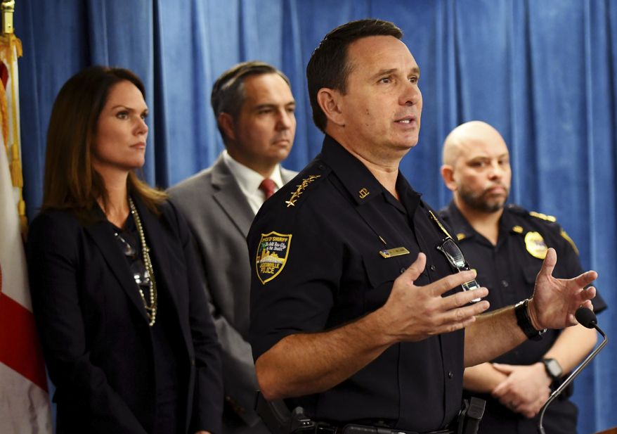 Jacksonville Sheriff Mike Williams, center, speaks during a news conference Friday, Jan. 13, 2017, in Jacksonville, Fla., where it was announced they found Kamiyah Mobley alive and well in South Carolina. Mobley was kidnapped from a Jacksonville hospital as a newborn 18 years ago. Police arrested Gloria Williams, 51, of Walterboro, S.C., at the home Mobley was living in and charged her with kidnapping and interference with custody. Listening, from left, State Attorney Florida's 4th Judicial Circuit Melissa Nelson, FBI Special Agent-in-Charge of the Jacksonville Division, Charles Spencer, and JSO Director of Investigations and Homeland Security Ron Lendvay. (Bob Mack/The Florida Times-Union via AP)
