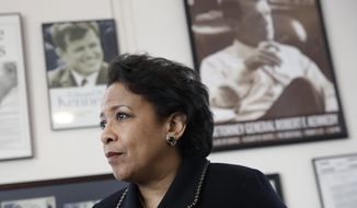 In this Jan. 12, 2017, file photo, then-Attorney General Loretta Lynch speaks during an interview with The Associated Press at the University of Baltimore School of Law in Baltimore. (AP Photo/Patrick Semansky)