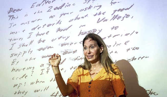 In this Nov. 30, 2016 photo, noted handwriting expert Michelle Dresbold of Pittsburgh&#x27;s East End discusses a letter writted by the unidentified Zodiak Killer with members of the Students Conquering Cold Cases Club at the University of Pittsburgh, in Pittsburg.  (Stephanie Strasburg /Pittsburgh Post-Gazette via AP)