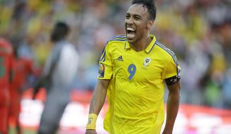 Gabon&#39;s Pierre Emerick Aubameyang celebrates after scoring against Guinea Bissau during their African Cup of Nations Group A soccer match between Gabon and Guinea Bissau at the Stade de l&#39;Amitie, in Libreville, Gabon Saturday Jan. 14, 2017. (AP Photo/Sunday Alamba)